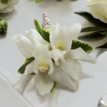 White Mini Cymbidium Boutonniere –  Flowers By Willie, Marshall TX
